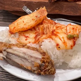 Kimchi, side of rice ($3), and a partly eaten wing