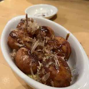 Takoyaki- This was tasty. Crispy outer layer and overall flavorful. Would recommend it.
