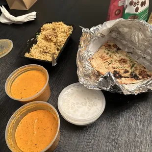 Pictured: Chicken Biryani, Garlic Naan, Paneer Tikka Masala, Butter Chicken Not pictured: Samosa