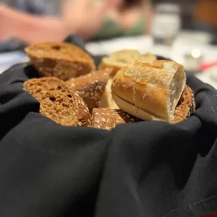a plate of bread and rolls