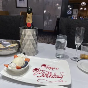 Birthday dessert!  Vanilla bean ice cream with fruit