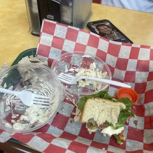 Turkey club with avocado and white American cheese. Red skin potato salad and coleslaw