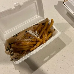 french fries in a styrofoam container