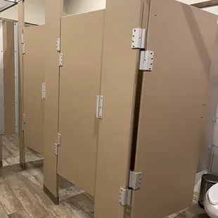 a row of restroom stalls