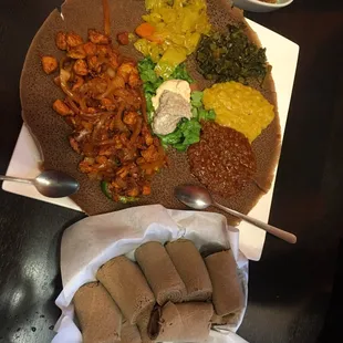 Vegetarian combo platter along with chicken tibs