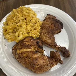 Delicious chicken with some Mac &amp; Cheese.