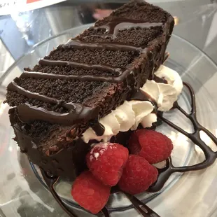 Chocolate cake with raspberries &amp; cream