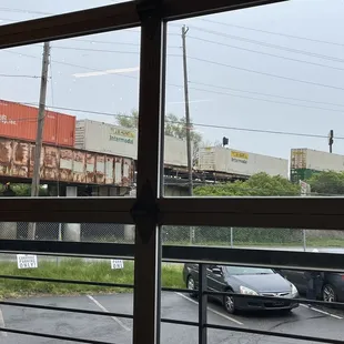 Cool, urban vibe with the train going by