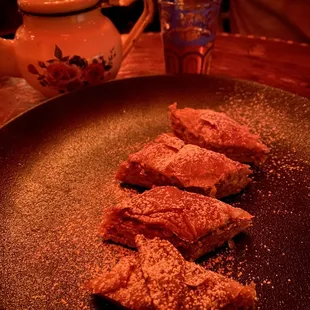 Green mint tea served in "authentic" real North African tea pot. And delicious delicate baklava