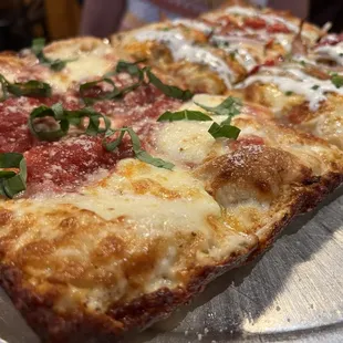 Deep dish. Half Margherita / Half Buffalo Chicken - some of the best pizza we&apos;ve ever had