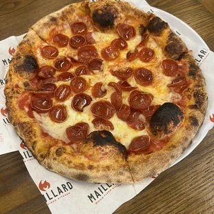 Pepperoni pizza at Mallard. Try with their different grindable peppers and hot honey.