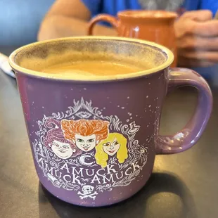 a cup of coffee and a man