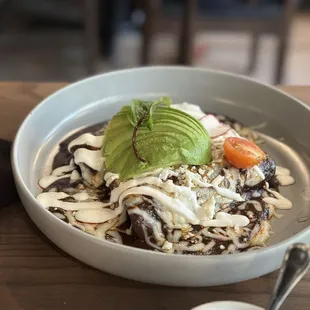 Chicken enchiladas with red mole sauce