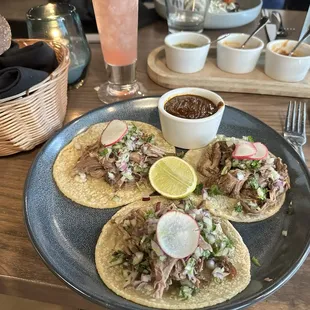 Lamb tacos with red mole sauce