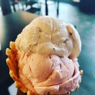Vanilla, Toasted Strawberry, Chocolate Love ice cream on a waffle cone.