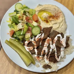 Gyro with tzatziki rice, salad, hummus