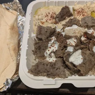 Gyro plate with hummus and baba ghanoush.