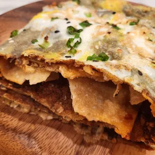 House Crepe with chili oil ($7.99). I added my own pork sung/floss at home. So good! 10/6/2022