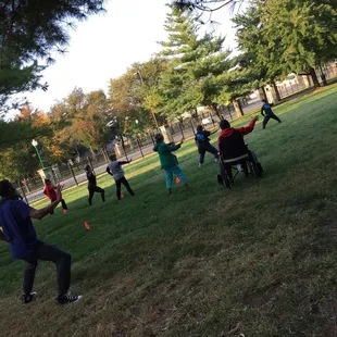 Participants practicing The one in the wheel chair followed the upper body movements.