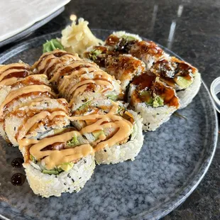 Left: crab crunch roll (cooked), right: salmon skin roll (cooked)