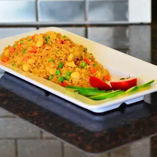 a plate of rice and vegetables