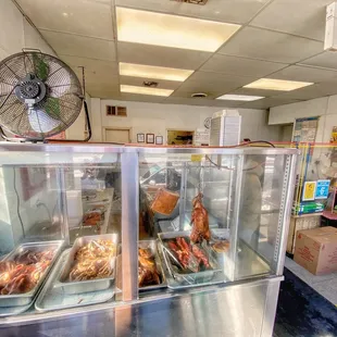 a display case with various foods