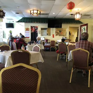 a restaurant with tables and chairs