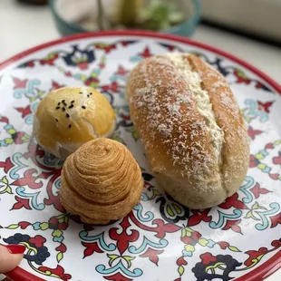 Red bean pastry, passion fruit &amp; the large one is coconut cream pastry. YUM!