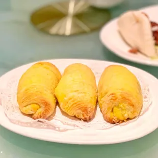 three plates of food on a table