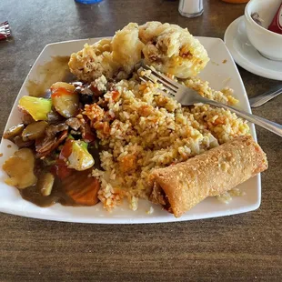 Beef and broccoli and garlic chicken #45, came with soup or egg roll. For a small upcharge you can get both. Before tip it was $10