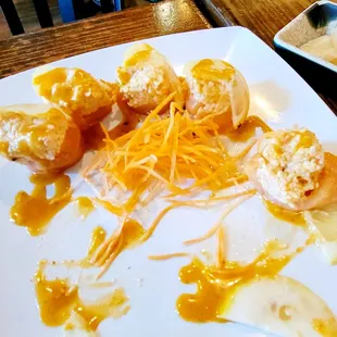 Salmon Crown Roll was missing the masago, crab meat was thinnedout with cream cheese but the salmon was good.