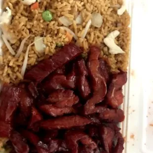 rice, meat, and vegetables in a styrofoam container