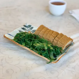 Bean curd roll and seaweed salad