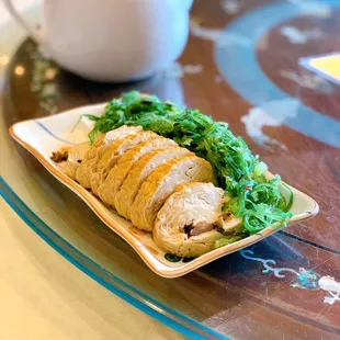Bean curd roll and seaweed salad