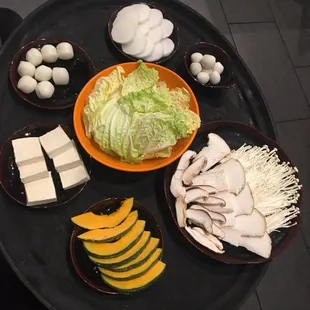 Tofu, fish ball, daikon, quail egg, napa cabbage, mushroom medley, kabocha