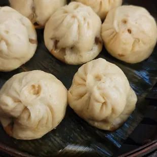 a plate of steamed dumplings