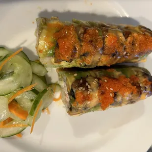 The &quot;Happy&quot; roll and sunomono. Take out was a bit disheveled but the taste made me very happy!