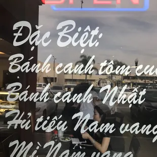 a woman sitting at a table