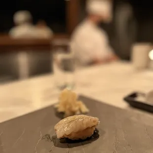 a chef in the background