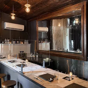 a bar with a long counter