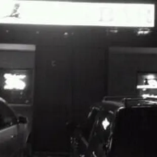 a car parked in front of a restaurant