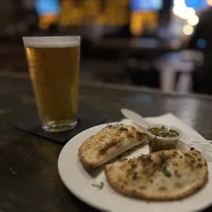 Beef and mushroom empanada and a Ghost Town IPA.