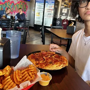 Pizza and awesome waffle fries.