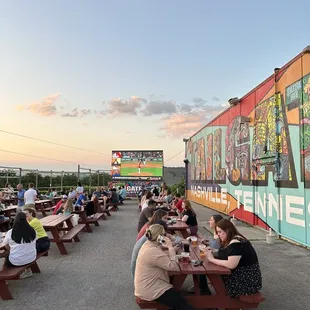 Detroit pizza here is ridiculously good! Great outdoor area with a massive TV and dogs may hang out. Could use some live music on occasion.