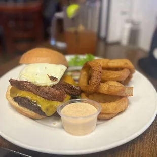 Widow Maker: Burger topped with an egg, extra cheese, and applewood smoked bacon