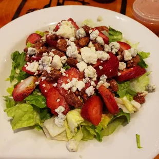 Summer salad - strawberries, blue cheese, candied pecans &amp; raspberry vinaigrette.  Soooo good!
