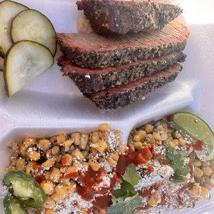 a plate of meat and vegetables