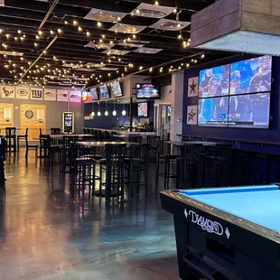 a pool table in the foreground