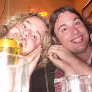 two men sitting at a table