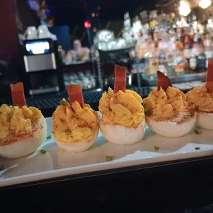 Devilled eggs with bacon